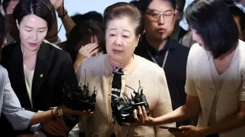 Disputed Church Leader Dismisses Bribery Claims Against Former South Korean President's Wife